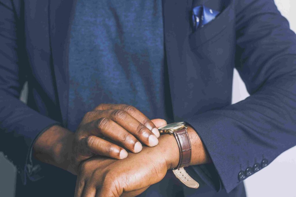 Men pairing watch with a formal attire