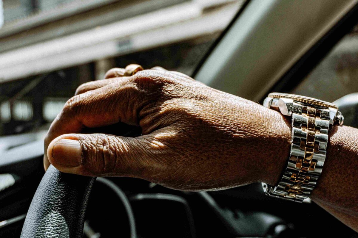 Closeup of a man wearing silver watch