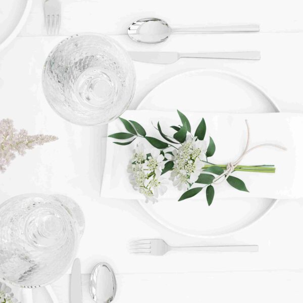 A table arrangement with both porcelain and glass dinner set
