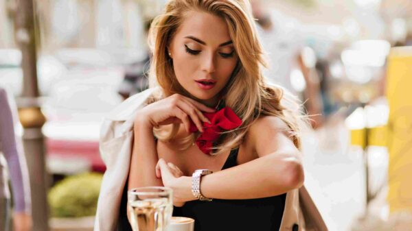 A woman looking at her watch