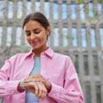 Woman looking at her watch