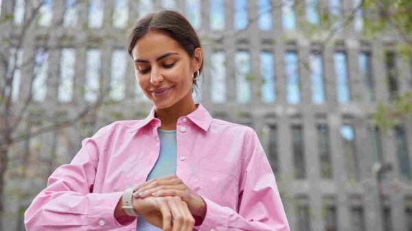 Woman looking at her watch